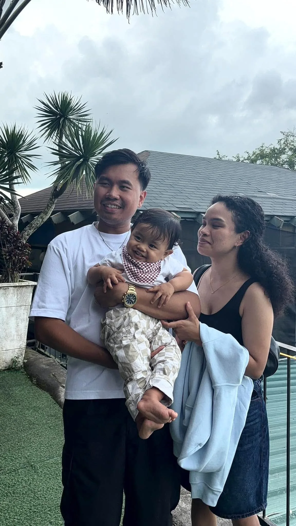 The family enjoying a moment outdoors